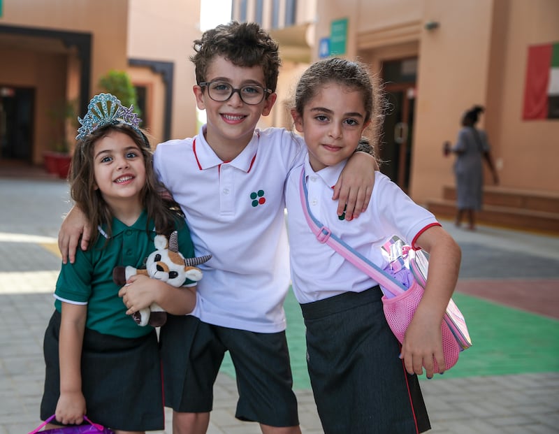 All smiles as pupils return to Raha International School Abu Dhabi. Victor Besa / The National