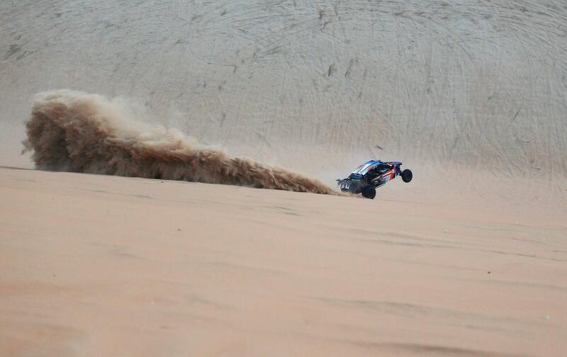 A dune buggy driver trains before competing. Karim Sahinb / AFP Photo