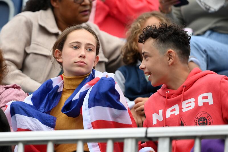 Spectators enjoy the atmosphere before the opening ceremony. Getty