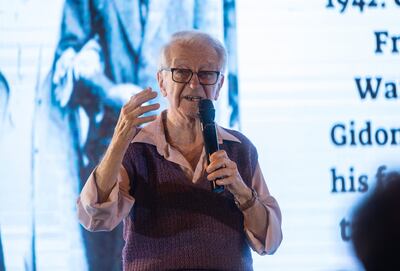 Gidon Lev tells of being a prisoner of the Nazis during the International Holocaust Remembrance Day at the Crossroads of Civilizations Museum in Dubai.  Ruel Pableo for The National
