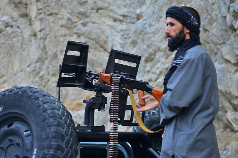 A fighter for the anti-Taliban forces stands guard in Rah-e Tang, Panjshir province. AFP