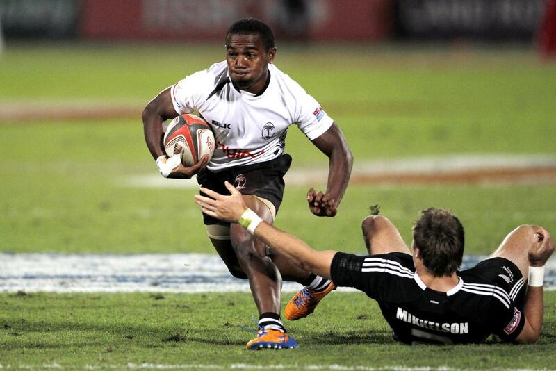 There was no stopping Waisea Nacuqu, left, and Fiji on Saturday as they routed New Zealand 44-0 then dispatched South Africa 29-17 to win their first Dubai Rugby Sevens title. Nikhil Monteiro / Reuters

