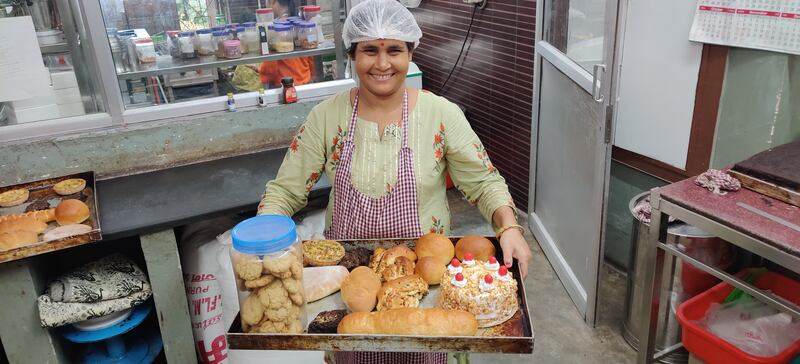 Kamala Darji shows off her baked goods at Cafe Crust and Core. Photo: Iswar Sankalpa