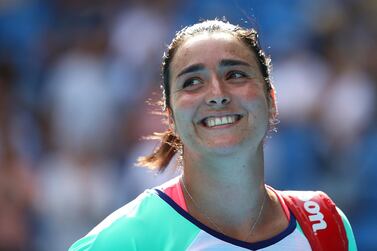 Ons Jabeur of Tunisia smiles after winning her Women's Singles fourth-round match against Qiang Wang of China at the Australian Open. Getty