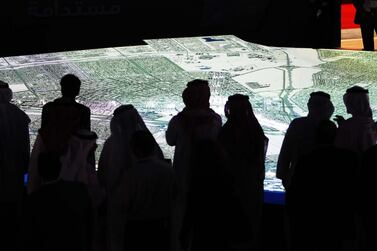 A giant model of Abu Dhabi is shown at the 2010 CityScape Abu Dhabi. The National