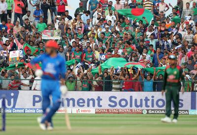 Abu Dhabi, United Arab Emirates - September 20, 2018: Bangladesh fans during the game between Bangladesh and Afghanistan in the Asia cup. Th, September 20th, 2018 at Zayed Cricket Stadium, Abu Dhabi. Chris Whiteoak / The National