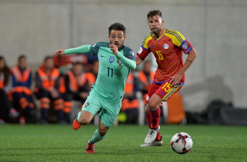 Portugal midfielder Bernardo Silva vies for the ball with Andorra’s Moises San Nicolas. Vincent West / Reuters