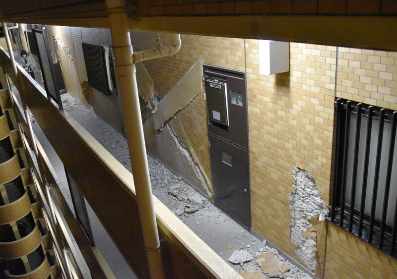 Part of the wall of a condominium collapsed. Reuters