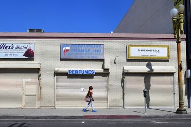 Closed stores in Los Angeles, California, during a coronavirus lockdown period. A Reuters survey of economists forecast that US nonfarm payrolls are set to fall by a record 22 million in April, way higher than the 800,000 laid off at the peak of the 2007-2009 recession. AFP