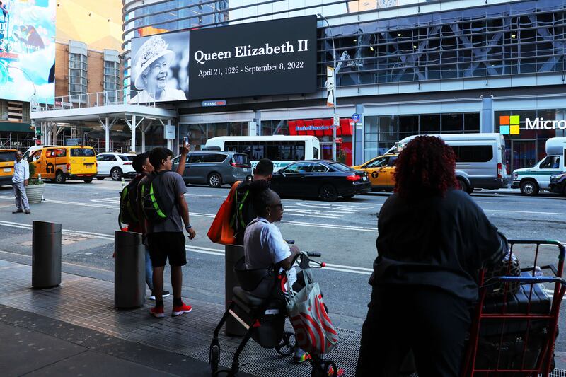 A tribute billboard for Queen Elizabeth is seen on Eighth Avenue in New York. Getty Images / AFP