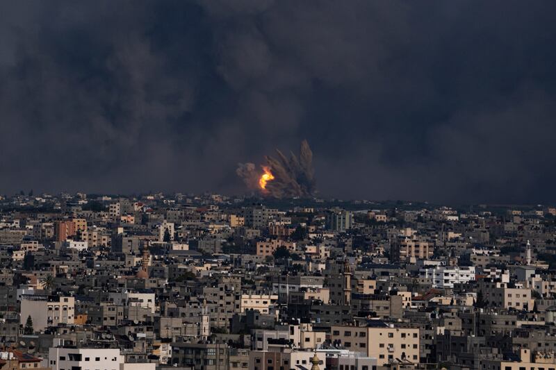 Fire and smoke rise following an Israeli air strike, in Gaza city. AP