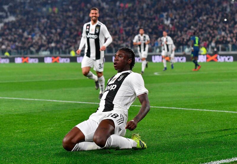 Moise Kean celebrates after scoring against Udinese. ANSA via AP