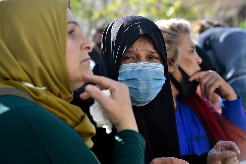 Families and relatives of fugitive prisoners who had fled a detention center gather in Baabda.  EPA