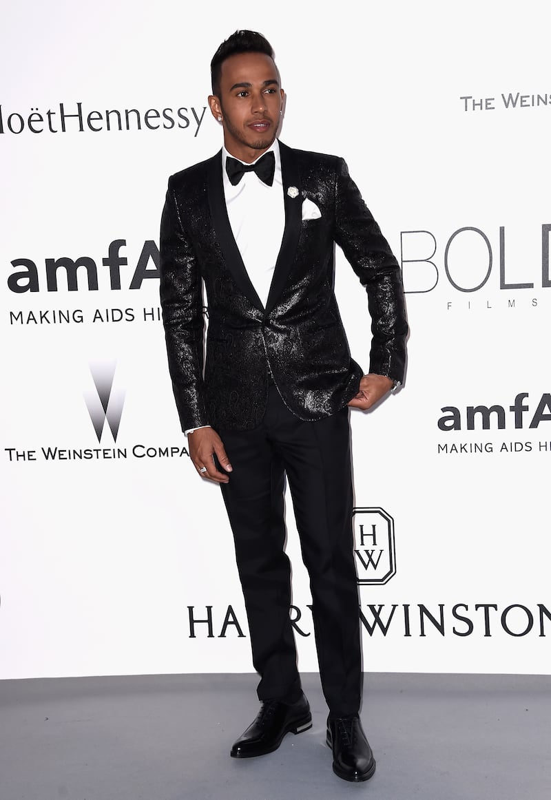 Lewis Hamilton, in a black textured tuxedo, attends amfAR's 22nd Cinema Against Aids Gala at Hotel du Cap-Eden-Roc on May 21, 2015, in Cap d'Antibes, France. Getty Images