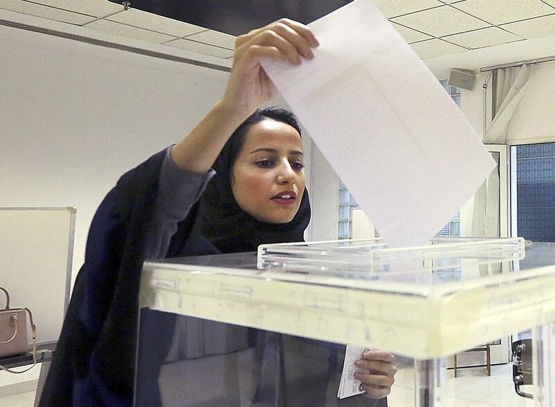 A Saudi woman casts her ballot at a polling centre during municipal elections in Riyadh, Saudi Arabia on December 12, 2015 in the kingdom’s first election to allow women candidates and voters. Aya Batrawy /  AP Photo