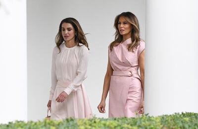 epa06840185 US First Lady Melania Trump (R) and Queen Rania (L) of Jordan walk down the Colonnade of the White House behind their husbands US President Donald J. Trump and King Abdullah II, in Washington, DC, USA, 25 June 2018.  EPA/Olivier Douliery / POOL