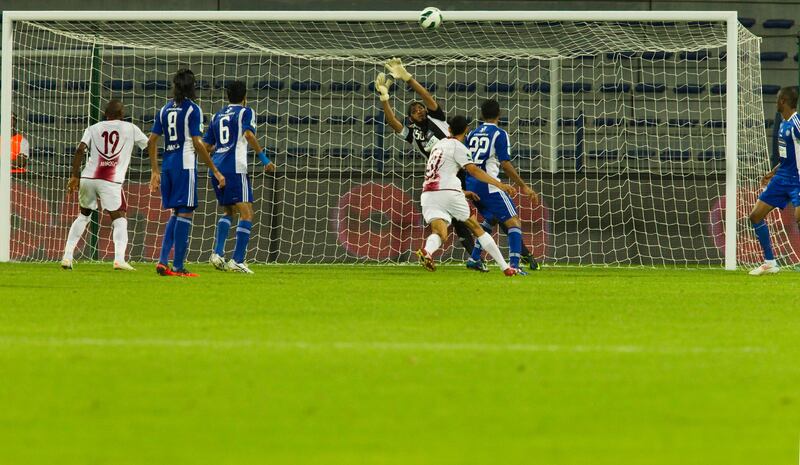 Dubai, United Arab Emirates - November 18 2012 - Goalkeeper for Al Nasr Abdulla Moosa Ali saves a goal. Al Nasr beat Al Wahda 4-1 at Al Nasr Stadium on Sunday night. (Razan Alzayani / The National) 