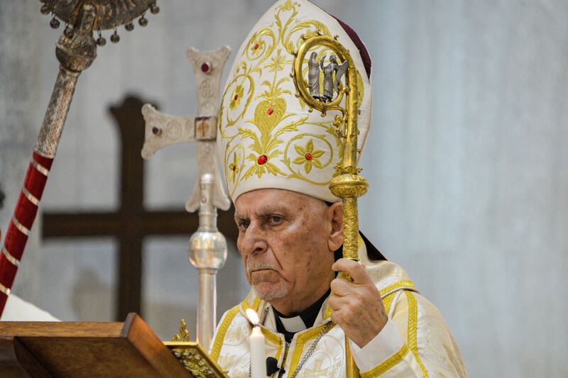 Syriac Catholic Archbishop of Mosul Youhanna Boutros Moshe leads Christmas Eve Mass in Iraq's predominantly Christian town of Qaraqosh in Nineveh province, on December 24, 2021. AFP