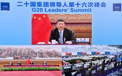 In this photo released by China's Xinhua News Agency, Chinese President Xi Jinping speaks via video link to leaders at the G20 Summit from Beijing.  AP