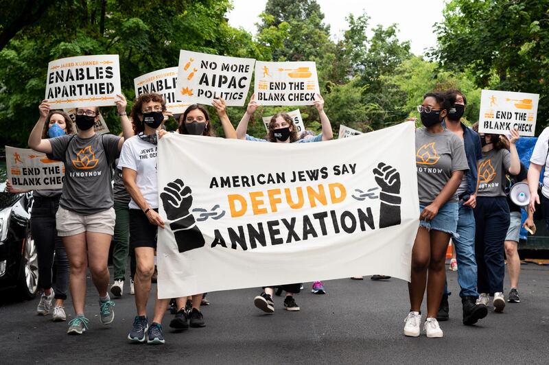 July 7, 2020 - Washington, DC, United States: Protestor holding a banner with the words "American Jews say defund Annexation" at a protest  near the home of Ivanka Trump and Jared Kushner against Israel's possible annexation of the West Bank. The protest was organized by IfNotNow and IfNotNow DC. (Photo by Michael Brochstein/Sipa USA)No Use UK. No Use Germany.