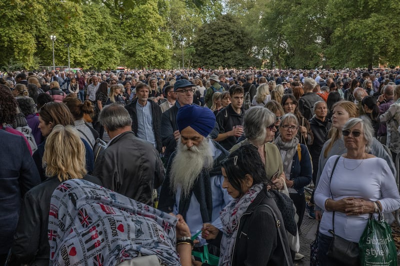 Mourners stand in the queue in Southwark Park to see Queen Elizabeth II lying in state. Getty Images