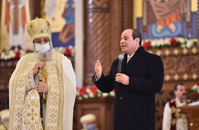 President Abdel Fattah El Sisi speaking alongside Pope Tawadros II, spiritual leader of Egypt's Coptic Orthodox Christians, during Christmas Mass on January 6. AFP 