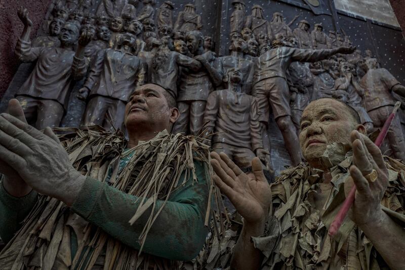 Devotees covered in mud and dried banana leaves take part in the Taong Putik ("mud people") Festival  in the village of Bibiclat in Aliaga town, Nueva Ecija province, Philippines. Each year, the residents of Bibiclat village in Aliaga town celebrate the Feast of Saint John by covering themselves in mud, dried banana leaves, vines, and twigs as part of a little-known Catholic festival. Getty Images