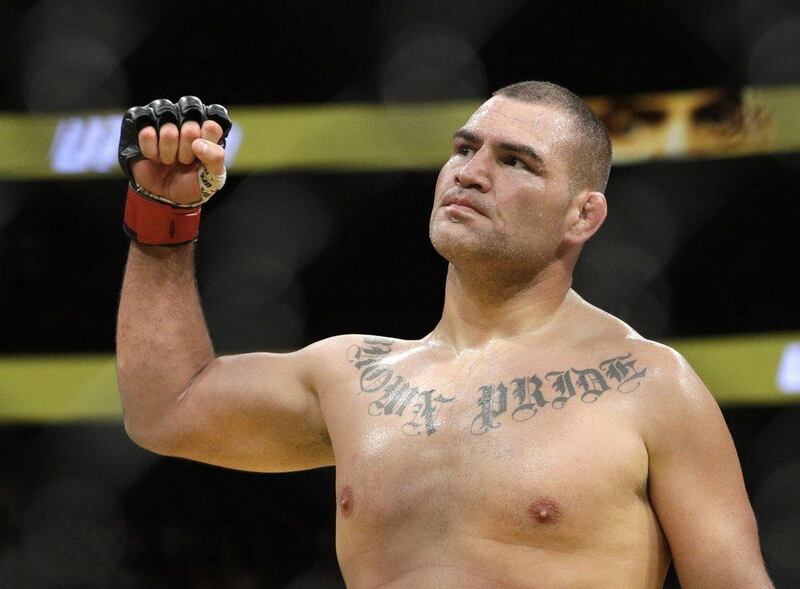 Cain Velasquez celebrates after defeating Travis Browne during their heavyweight bout at UFC 200, Saturday, July 9, 2016, in Las Vegas. John Locher / AP Photo