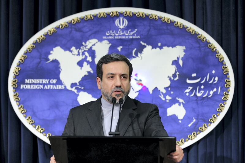 Newly appointed Iranian Foreign Ministry spokesman Abbas Araghchi addresses the room during a press conference in Tehran on May 14, 2013. AFP PHOTO/ATTA KENARE / AFP PHOTO / ATTA KENARE