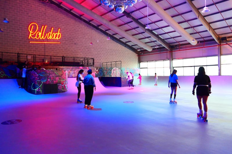 People doing roller skating at the RollDXB roller disco which opens at Shed 3 Marina Cubes Street, Dubai Maritime City, Port Rashid, Bur Dubai on April 25,2021. (Pawan Singh/The National). Story by Sophie Prideaux 