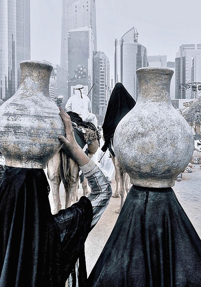 Andy Anderson, American, ���Water Bearers and Wedding Procession I will miss the Qasr al Hosn Heritage Festival where I was able to find these kinds of UAE cultural images.
