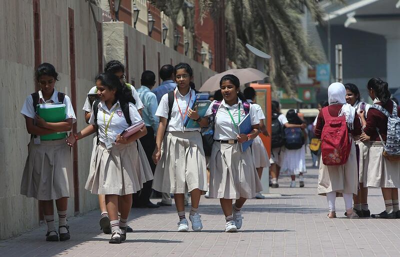Pupils at Indian High School on Oud Mehta Road in Dubai return to class on Sunday. Satish Kumar / The National 