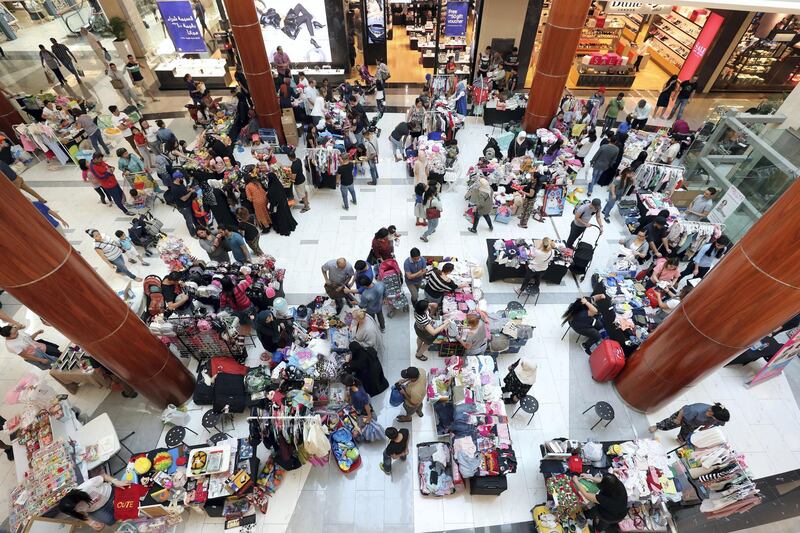 Dubai, United Arab Emirates - November 17, 2018: Shoppers and sellers come to Baby Bazaar to buy and sell baby and children's items. Saturday the 17th of November 2018 at Burjuman Mall, Dubai. Chris Whiteoak / The National