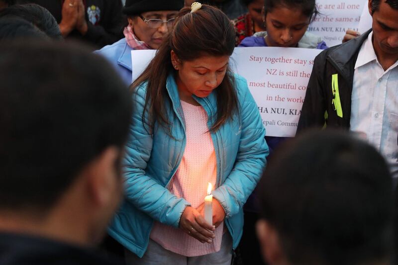 Mourners from the Nepali Community pay their respects for victims of the March 15 mosque attacks, in Christchurch. AFP