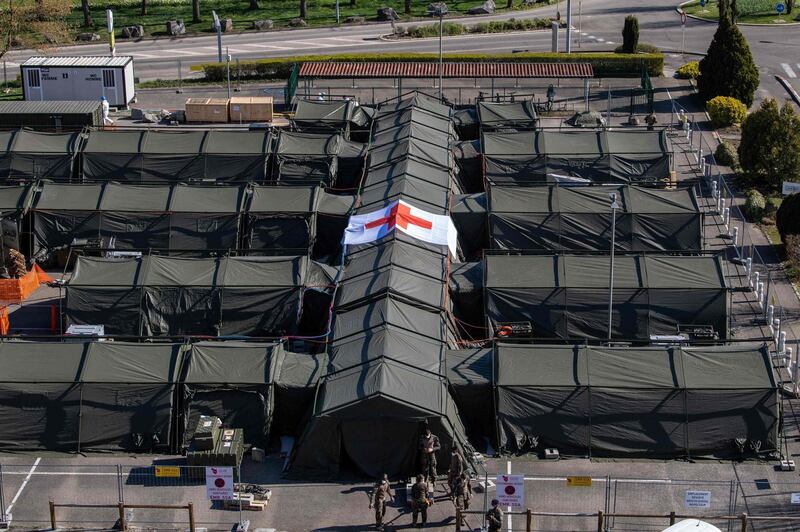 A picture taken from the roof the Emile Muller Hospital shows tents of a military field hospital during its setting up in Mulhouse, eastern France. AFP