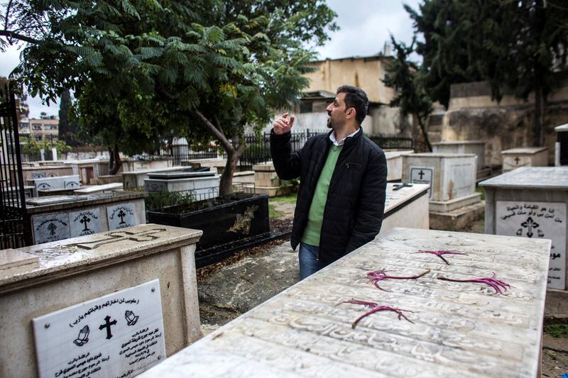 Greek Orthodox Christian Palestinian Kamal Ayyad in the cemetery at the the Church of Saint Porphyrius in Gaza City on December 20,2018.  Ayyad is one of 140 of GazaÕs 1,000 or so Christians who have been placed under Òsecurity blocksÓ and denied travel by Israel to Bethlehem for Christmas, according to Gisha, an Israeli human rights group focused on freedom of movement.(Photo by Heidi Levine for The National).