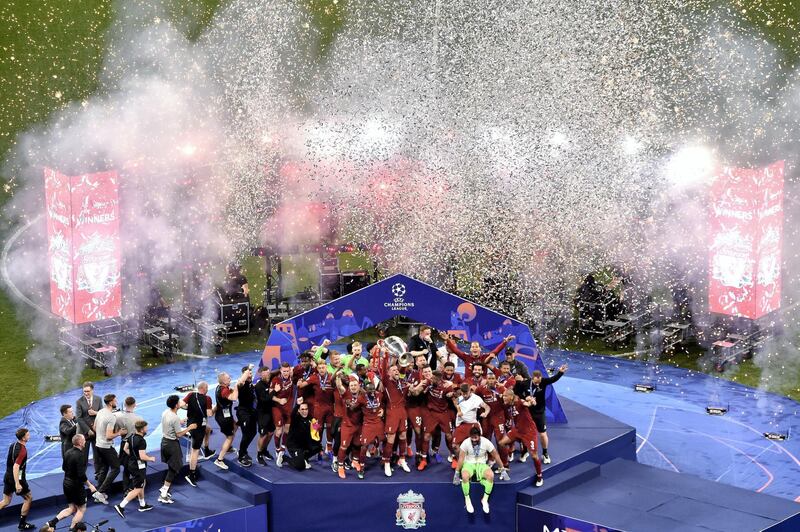 MADRID, SPAIN - JUNE 01: Jordan Henderson of Liverpool lifts the Champions League Trophy after winning the UEFA Champions League Final between Tottenham Hotspur and Liverpool at Estadio Wanda Metropolitano on June 01, 2019 in Madrid, Spain. (Photo by David Ramos/Getty Images)