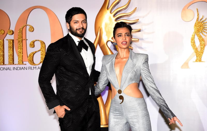 Bollywood actors Ali Fazal (L) and Radhika Apte arrive for the IIFA Rocks of the 20th International Indian Film Academy (IIFA) Awards at NSCI Dome in Mumbai on September 16, 2019.