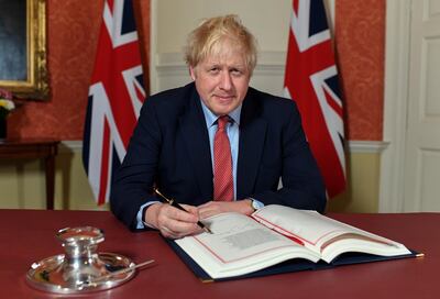 Image ©No10 Crown Copyright . 24/01/2020. London, United Kingdom. The Prime Minister Boris Johnson signing the official European Union (Withdrawal Agreement) Act 2020, inside No10 Downing Street.  Picture by Andrew Parsons / No10 Downing Street 