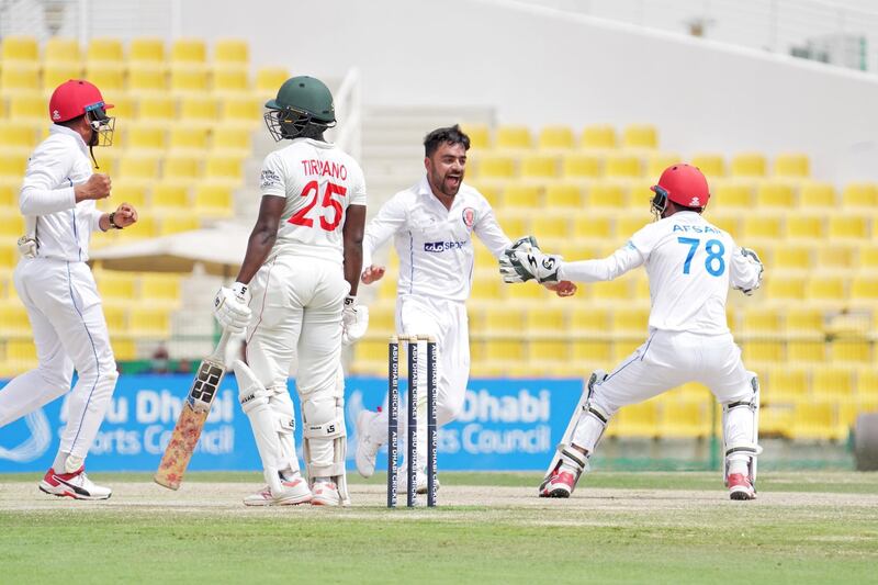 Afghanistan bowler Rashid Khan celebrates the wicket of Donald Tiripano. Courtesy Abu Dhabi Cricket