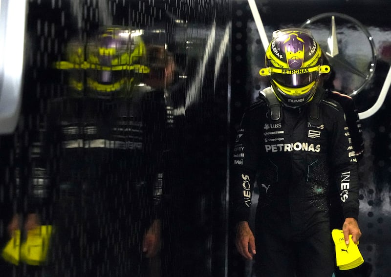 Lewis Hamilton prepares for the first practice session for the Formula One Japanese Grand Prix in Suzuka. EPA