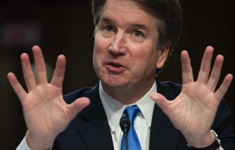 (FILES) In this file photo taken on September 05, 2018 (FILES) In this file photo taken on September 5, 2018; US Supreme Court nominee Brett Kavanaugh speaks on the second day of his confirmation hearing in front of the US Senate in Washington DC. Democrats in the US Senate are investigating a new bombshell allegation of sexual misconduct against President Donald Trump's nominee for the Supreme Court, The New Yorker said Sunday. Deborah Ramirez, 53, told the magazine Brett Kavanaugh exposed himself to her during a college party at Yale University in the 1980s, thrust his genitals in her face and caused her to touch them without her consent. / AFP / SAUL LOEB

