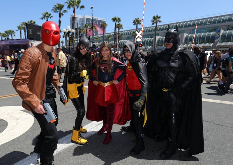 Attendees pose for a picture outside Comic Con International in San Diego. Mike Blake / Reuters