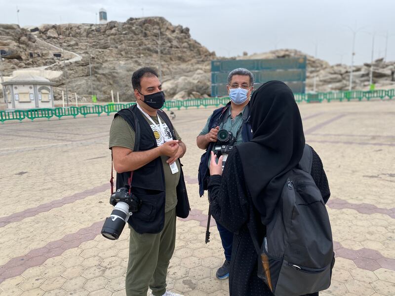Reem Khalid, 25, talking to reporters in her role as a media co-ordinator.