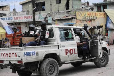 Police patrol the streets in Port-au-Prince. Reuters