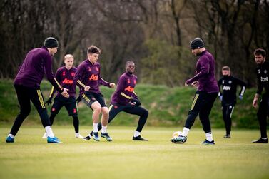 MANCHESTER, ENGLAND - APRIL 14: Victor Lindelof, Donny van de Beek, Daniel James, Aaron Wan-Bissaka, Luke Shaw of Manchester United in action during a first team training session at Aon Training Complex on April 14, 2021 in Manchester, England. (Photo by Ash Donelon/Manchester United via Getty Images)