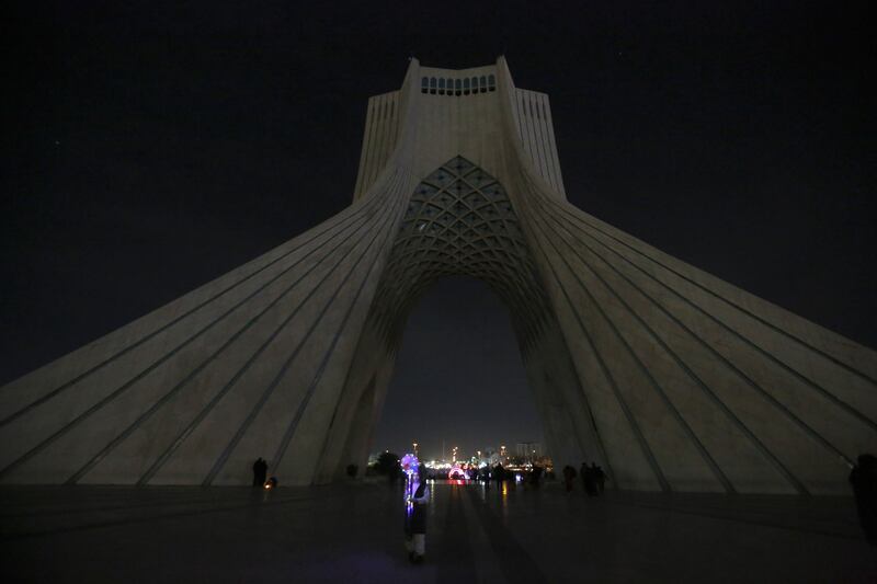 A general view of Azadi (Freedom) tower after its light is switched off during the world Earth Hour in Tehran, Iran. EPA
