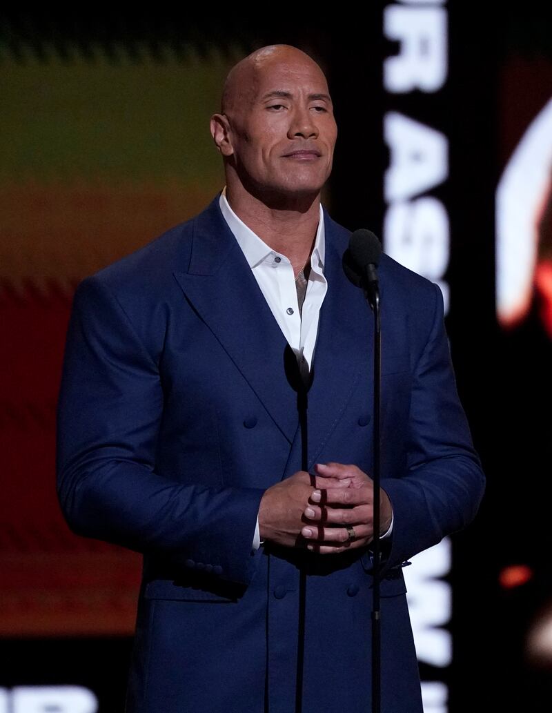 Dwayne 'The Rock' Johnson accepts the Arthur Ashe award for courage on behalf of mayor of Kyiv and former professional boxer Vitali Klitschko. AP Photo