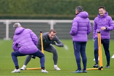 Tottenham Hotspur manager Jose Mourinho (left) and Tottenham Hotspur's Harry Kane during the training session at Tottenham Hotspur Training Centre, London. PA Photo. Picture date: Monday November 25, 2019. See PA story SOCCER Tottenham. Photo credit should read: Tess Derry/PA Wire