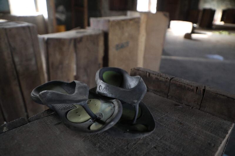 A discarded pair of sandals in Government Science College dormitory, in Kagara. Hundreds of pupils rushed to flee their dormitories when the armed gang descended. AFP